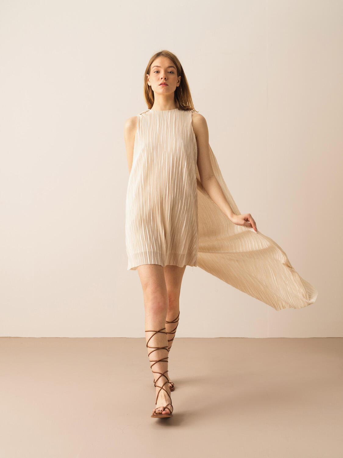 Xint Beige Mini Dress With Asymmetric Cape Back Design