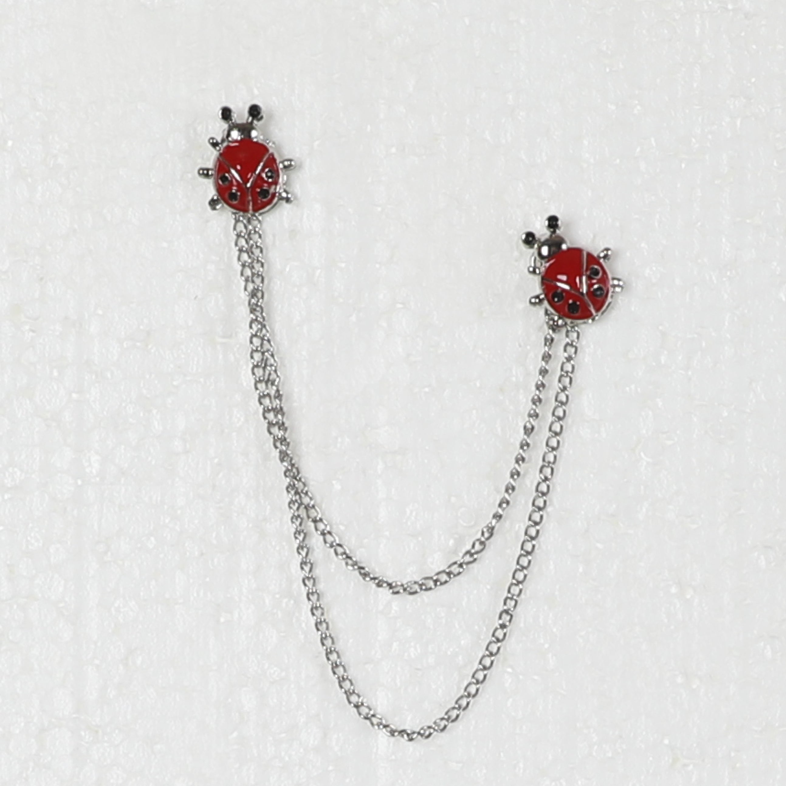 Silver Chained Pin With Ladybug Design