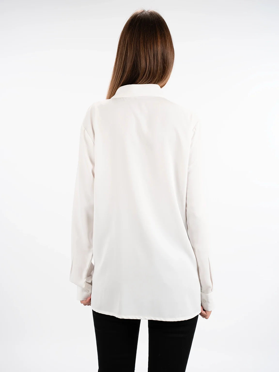 Long Sleeved White Shirt With Button To Close