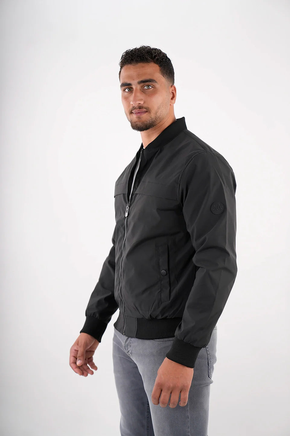 Black Bomber Jacket With Zipper To Close