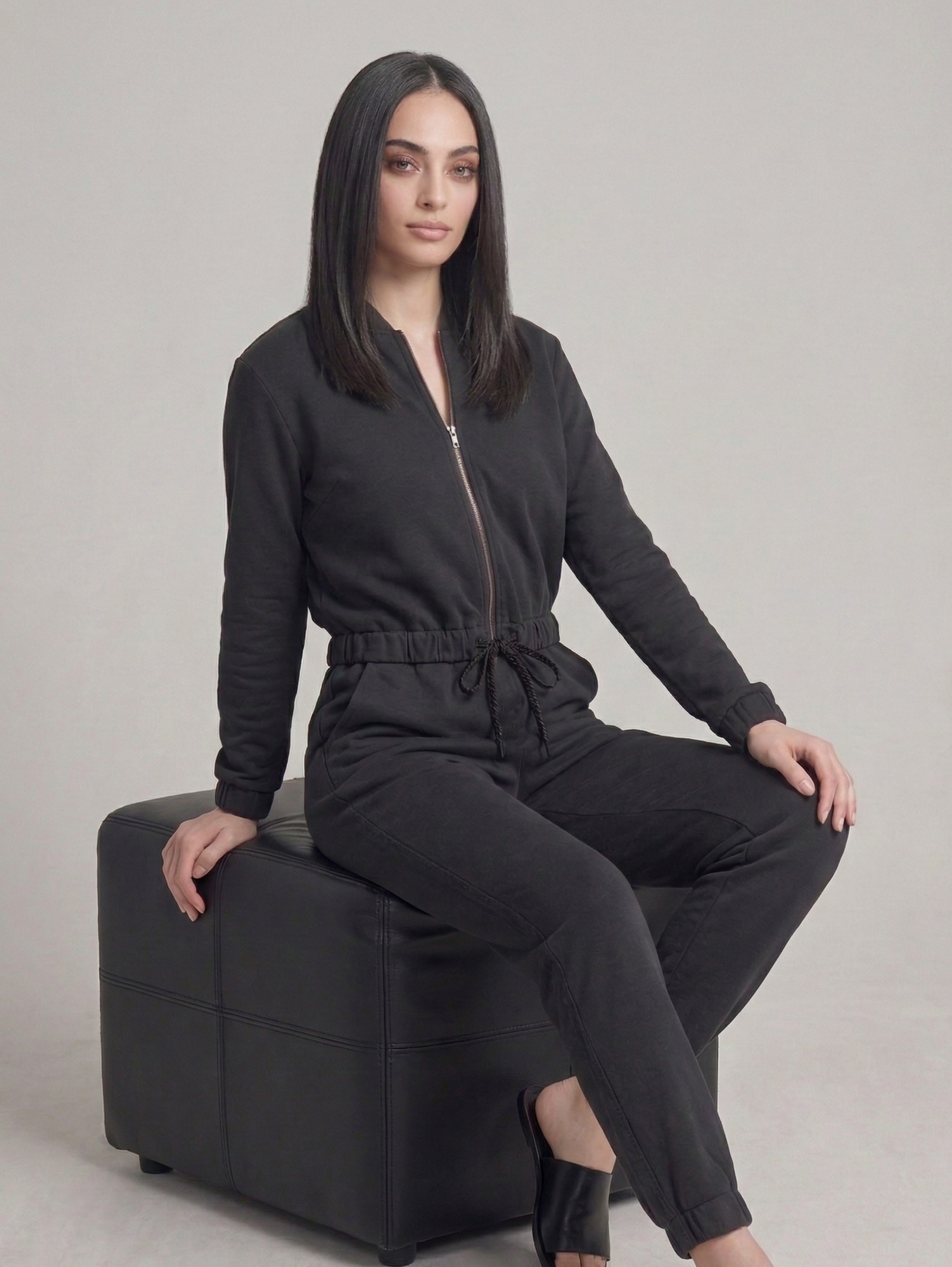 Black Two-Piece Set With Zip-Up Jacket And Matching Pants