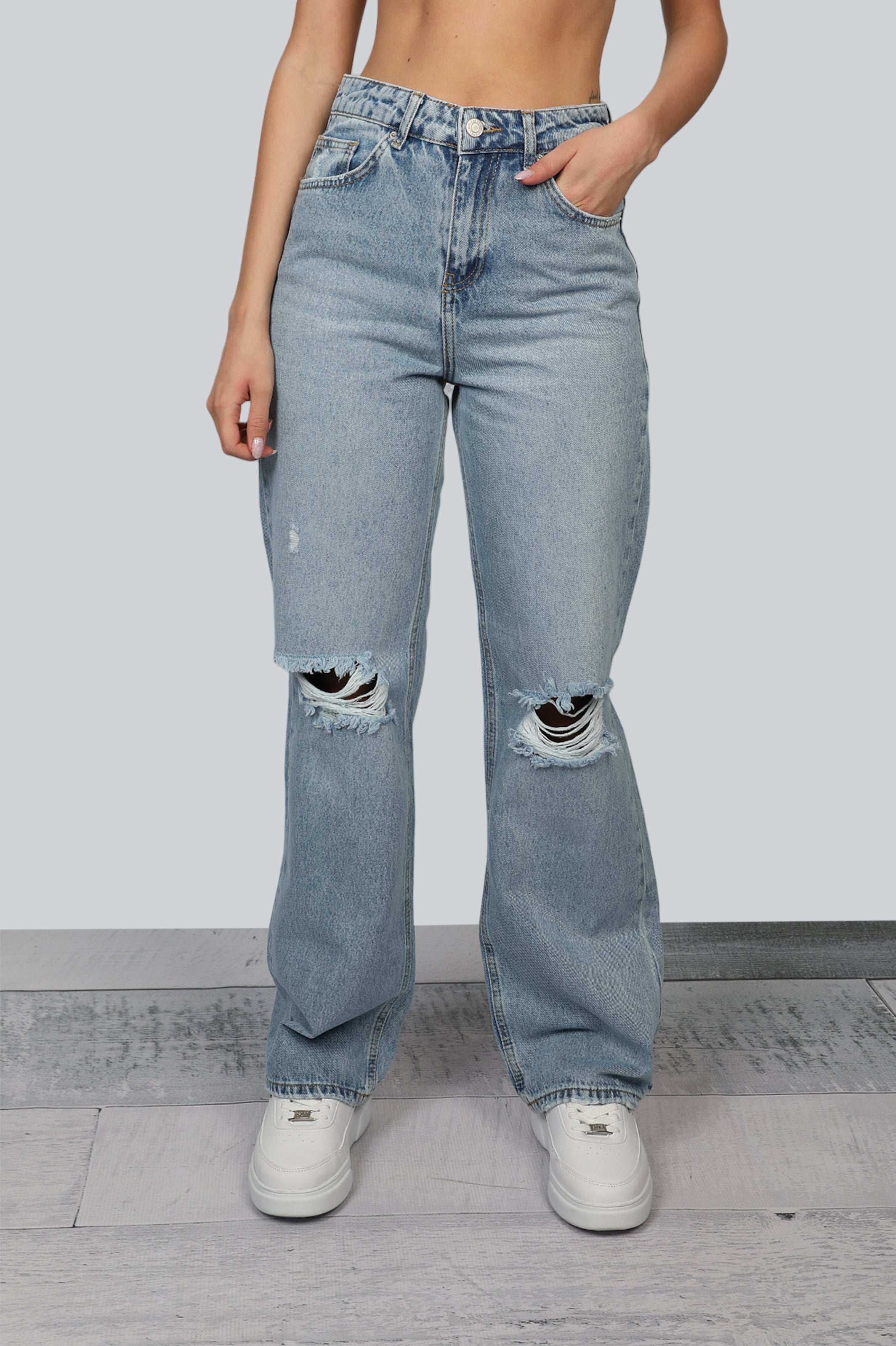 Women Light Blue Flare Jeans With Ripped Design