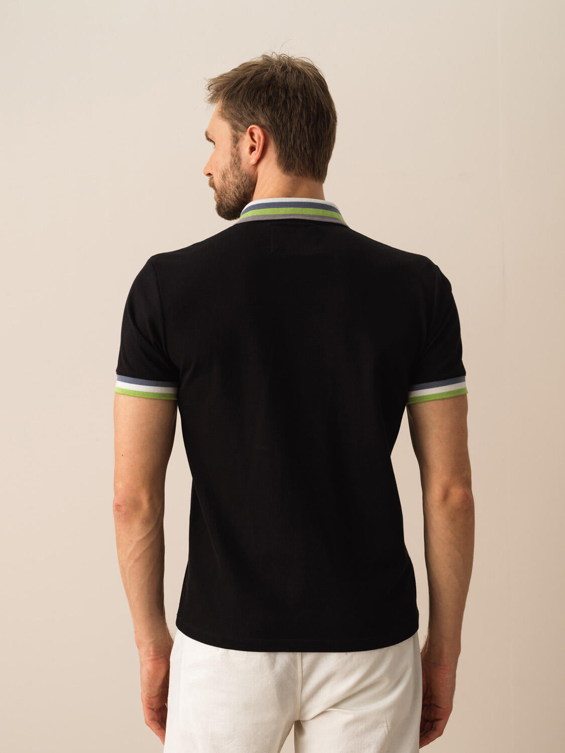 Men Black Slim-Fit Polo With Unique Design